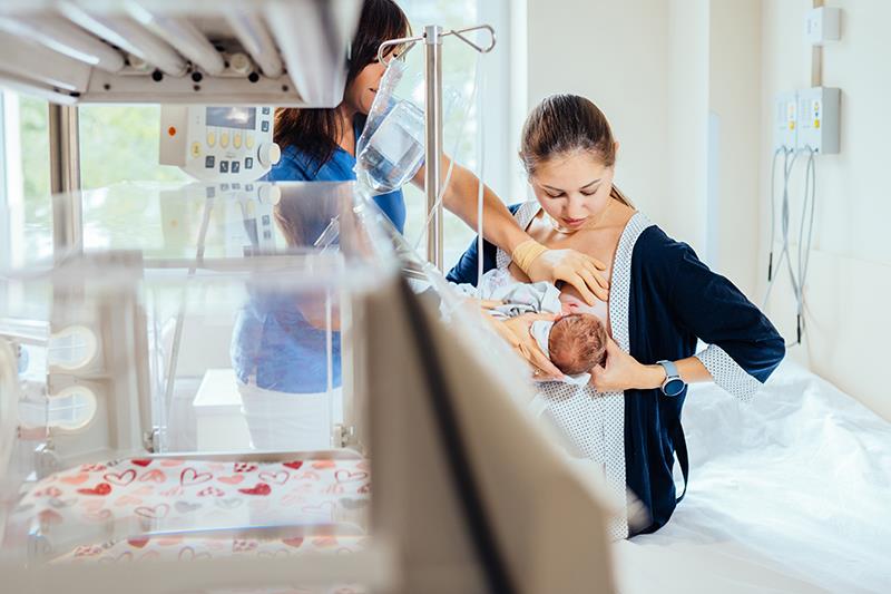 Wearable device tracks infant milk intake during breastfeeding